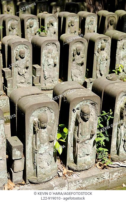 'Jizos' (little stone statue of a Buddhist saint who is in search of truth and who is the guardian of children) at Jyomyo-in temple, Tokyo