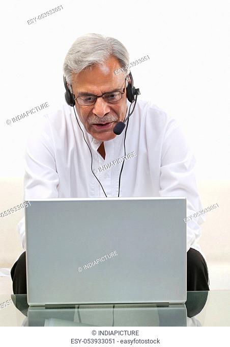Old man with a laptop