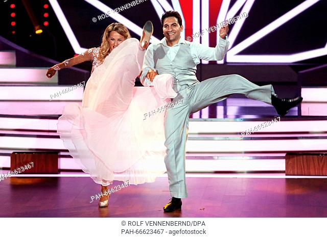 Attila Hildmann and professional dancer Oxana Lebedew dancing at the RTL dance show 'Let's Dance' at the Coloneum in Cologne, Germany, 11 March 2016