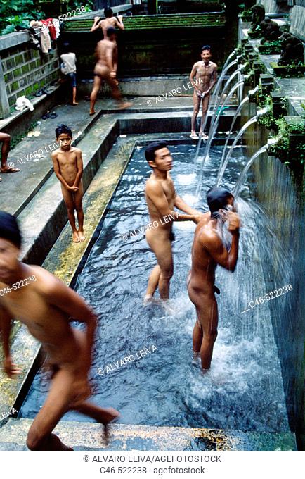 Men bathing near Ubud. Bali Island, Indonesia