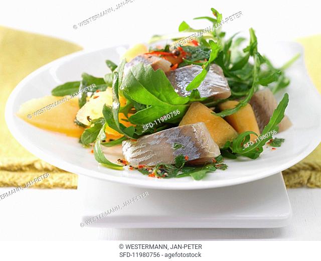 Fruity soused herring salad with melon