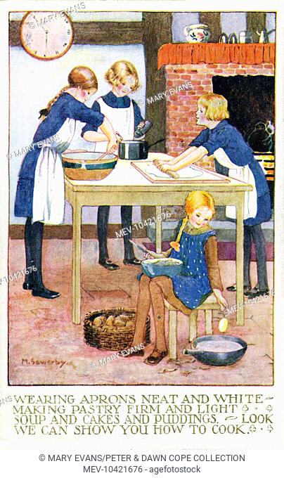 A group of girl guides busy in a kitchen making pastry and cakes
