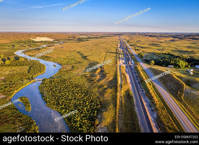 highway and railroad along the Middle Loup River in Nebraska Sandhills, late summer aerial view