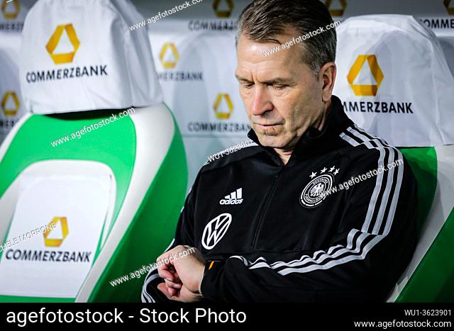 Wolfsburg, Germany, March 20, 2019: German national team head coach assistant watches the time during the international soccer game Germany vs Serbia at...