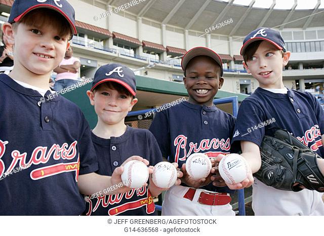 Barons Double A Minor League Baseball, fan, Black boy, little league players, autographed balls. Birmingham. Alabama. USA