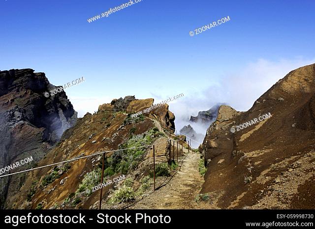 blue sky and brown rocks at the high mountains at madeira island called pico arieiro, the top is 1818 meters above sea level