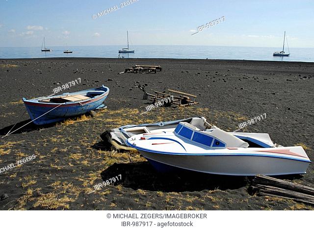 Boats on a black sandy beach on Stromboli Island, Aeolian or Lipari Islands, Tyrrhenian Sea, Sicily, South Italy, Italy, Europe