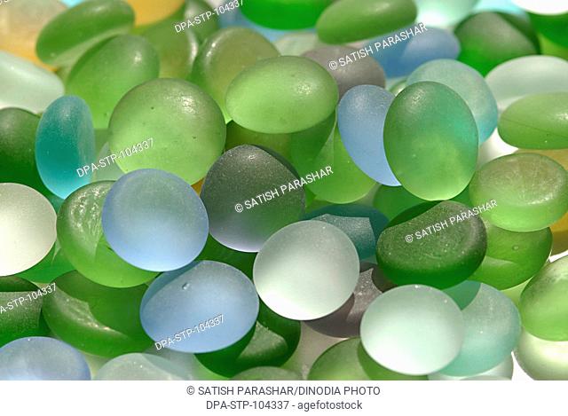 Colored glass marbles round stones