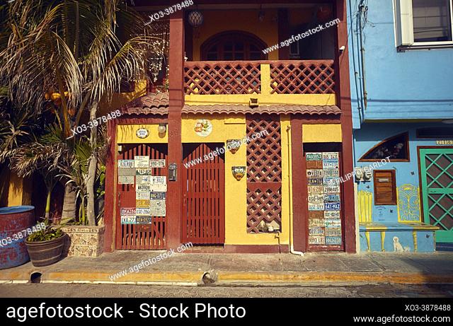 Street view of a neighborhood of Isla Mujeres in Mexico: You can see the palaces and the colored houses that form the urbanism of this beautiful Caribbean...