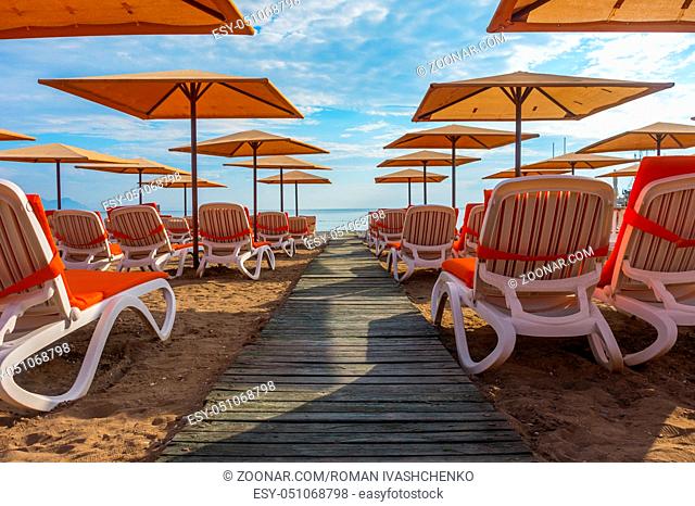 beach with sun loungers and parasols in Kemer