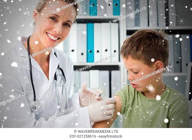 Little boy receiving injection by pediatrician
