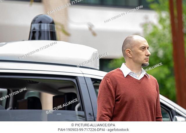 08 May 2019, US, Mountain View: Drago Anguelov, head of research at the Waymo robot car company, can be seen in front of a self-propelled car from Google's...