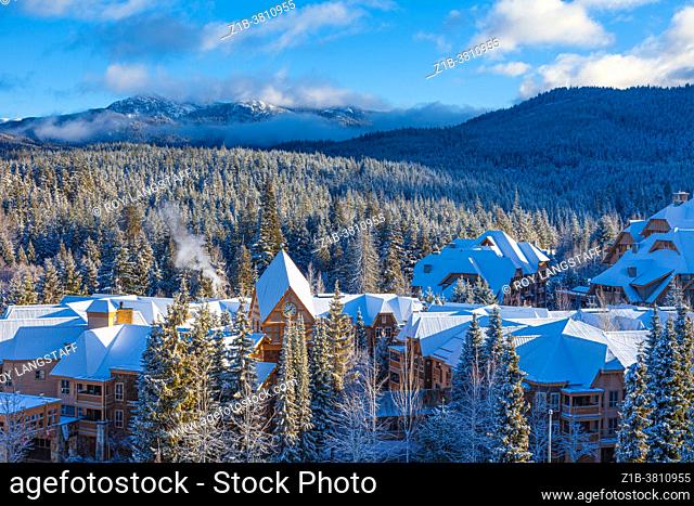 Morning after an overnight snowfall in mid-April in Whistler Village British Columbia Canada