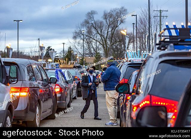 Southfield, Michigan - Cars line up for a Car Top Menorah Parade on the fourth night of Chanukah