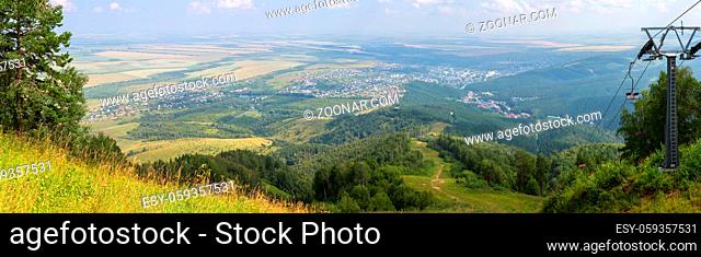 Beautiful summer panorama from Mount Tserkovka to the resort of Belokurikha in the Altai Krai