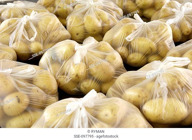 plastic bags of potatoes