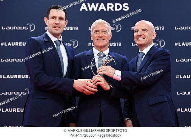 Franck Raviot, Dider Deschamps, Guy Stephanon. (Team of the Laureus World Sports Award Team of the Year) with the trophy