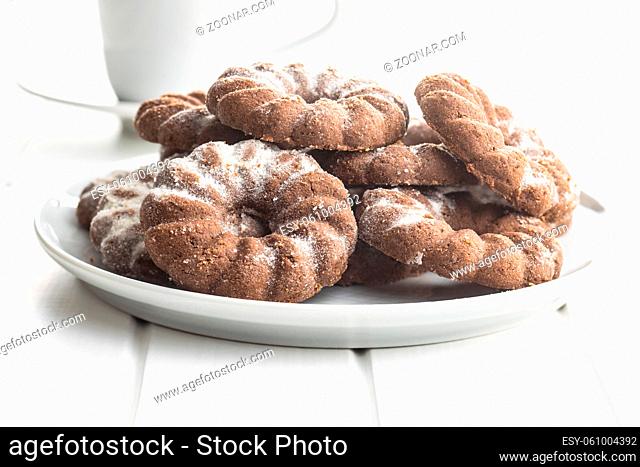 Sweet rings cookies. Biscuits with cocoa flavor on plate