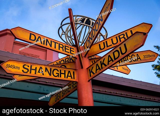 Sign post pointing towards famous landmarks and tourist sites in Australia