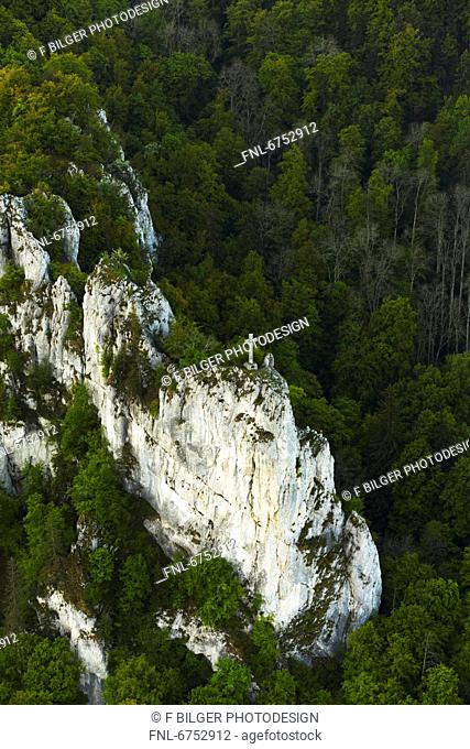 Limestone rocks with summit cross in the Danube Valley near Hausen, aerial photo