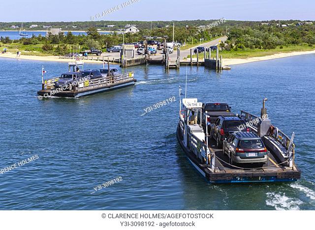 The Chappy Ferry transports cars, cyclists, and passengers across the harbor to Chappaquiddick Island in Edgartown, Massachussetts on Martha's Vineyard