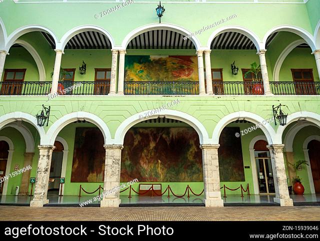 Merida, Yucatan, Mexico - 20 November 2018: The courtyard of the 'Palacio de Gobierno', the colonial Government Palace with paintings by Fernando Castro Pacheco