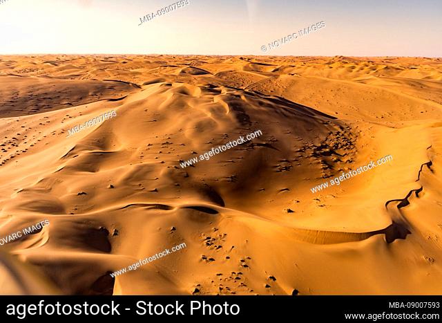 Flight over dunes of Sossusvlei at sunset, Namibia, Africa