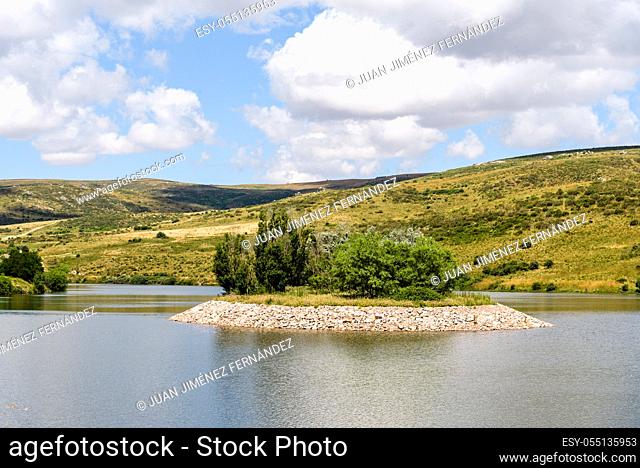 Reservoir dam a sunny day of summer. Las Navas del Marques, Avila