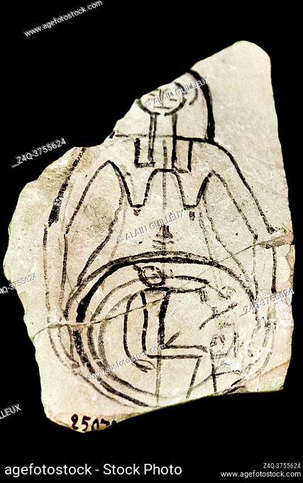 Egypt, Cairo, Egyptian Museum, an ostracon showing a goddess holding a sun disk with a child inside. This is in connection with the rebirth of the sun every...