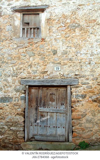 Old door housing in Villoslada de Cameros natural park of the Sierra Cebollera. La Rioja