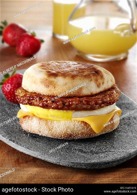 Mexican Chorizo sausage patty with fried egg and cheese on an english muffin breakfast sandwich