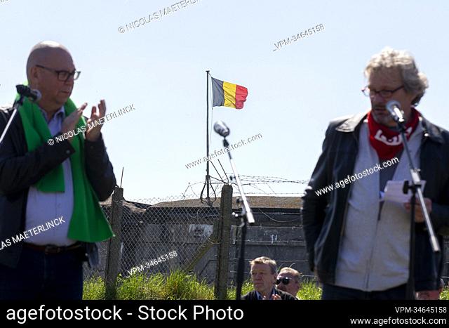 Illustration picture shows the Belgian flag as ACV/CSC christian union chairman Marc Leemans and FGTB General secretary Thierry Bodson deliver a speech during a...