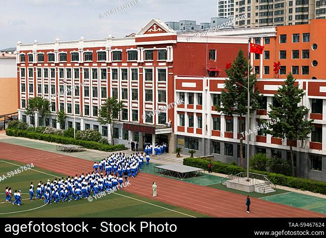 CHINA, SUIFENHE - MAY 26, 2023: Children attend an outdoor PE lesson at secondary school No 1 in the Chinese town of Suifenhe near the border with Russia