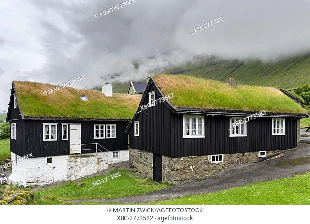 Village Nordragota, with traditional sod roofed houses. The island Eysturoy one of the two large islands of the Faroe Islands in the North Atlantic