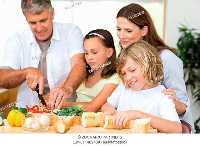 Family making sandwiches