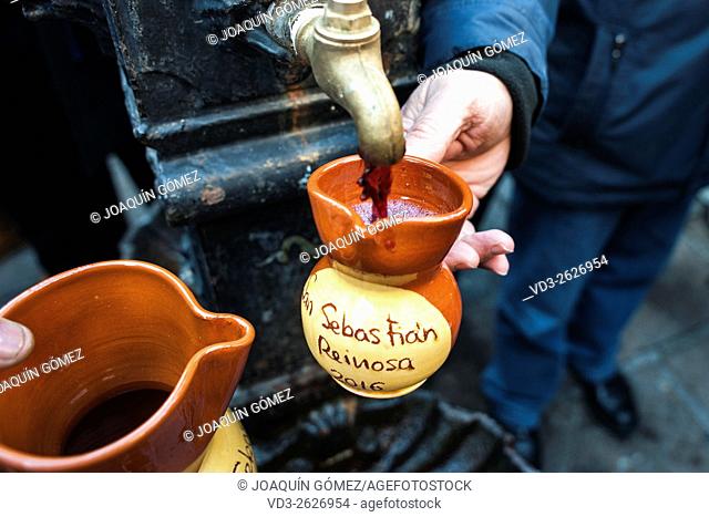 During the festival of San Sebastian in Reinosa (Cantabria) of the fountain in the square wine out. REINOSA-CANTABRIA-SPAIN