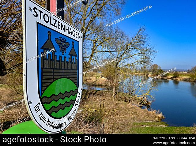 28 February 2022, Brandenburg, Stolzenhagen: A sign with the inscription ""Stolzenhagen Gate to the National Park ""Lower Oder Valley"" can be seen next to the...