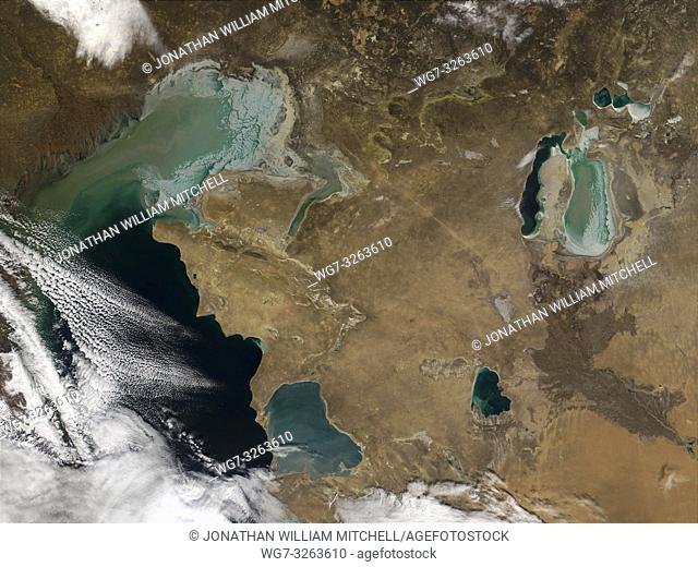 EARTH Central Asia -- 03 Dec 2001 -- In thisimage winter sea ice can be seen forming in the shallow waters of the northern Caspian (left) and Aral (upper right)...