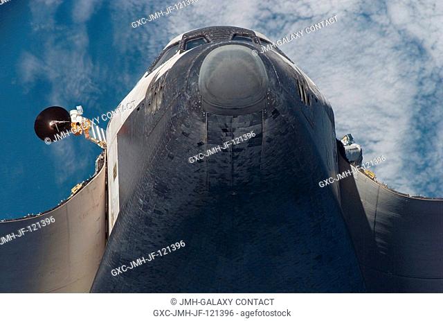 A low angle view of the nose and underside of the Space Shuttle Atlantis' crew cabin was provided by Expedition 16 crewmembers