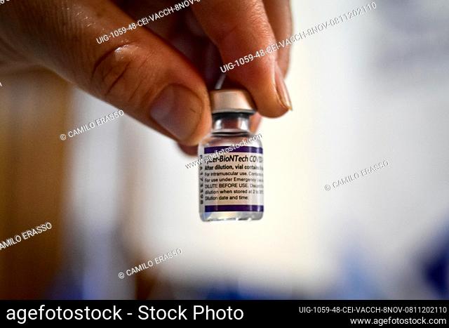 A nurse vaccinator holds a vial of the Fizer COVID-19 Vaccine as the Colombian goverment begins to vaccinate children between ages 3 to 11 against the...