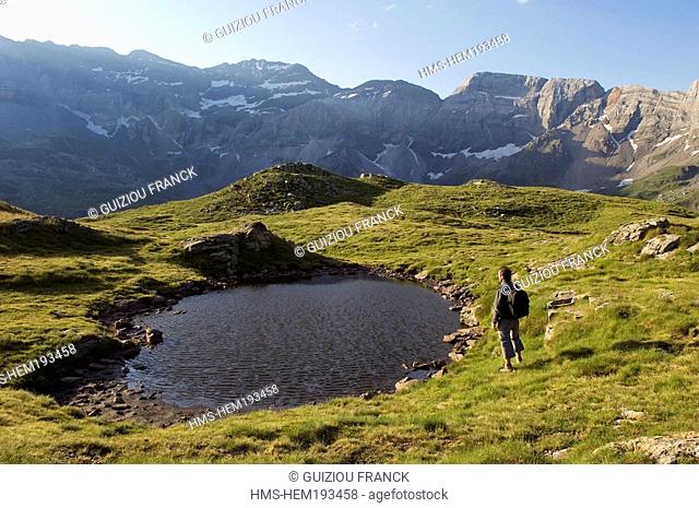 France, Hautes Pyrenees, Pyrenees National Park, hiker in the Cirque of Troumouse