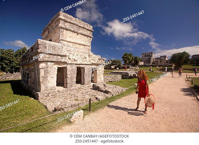 Tourists in Mayan Ruins at Maya archeological site of Tulum, Quintana Roo, Yucatan Province, Mexico, Central America