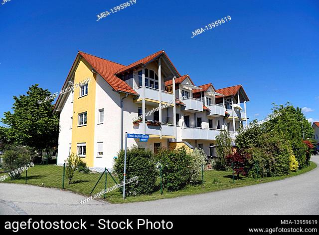 Germany, Bavaria, Upper Bavaria, Altötting district, residential complex, apartment building, dormer windows, tiled roof, balconies, garden