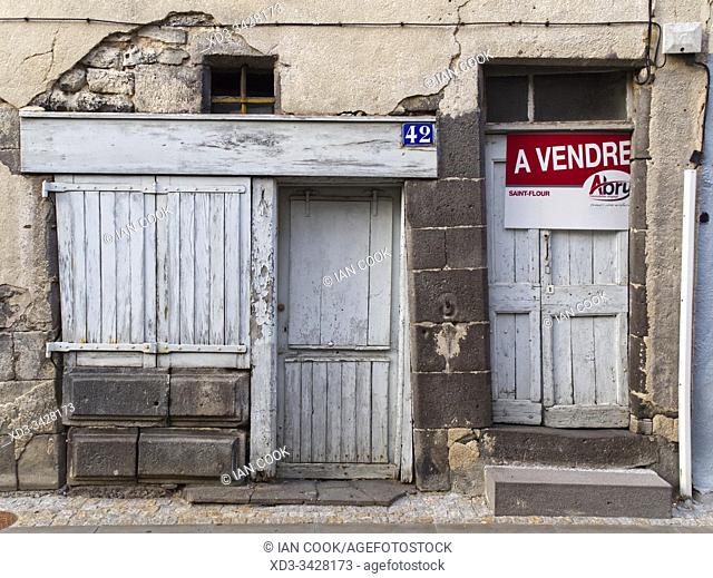 door and window of derelict house, Saint-Flour, Cantal Department, Auvergne, France