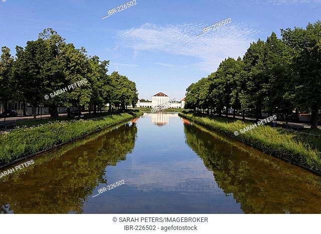 Canal of Castle Nymphenburg with parkway and middle part of Castle Nymphenburg in Munich, Upper Bavaria, Bavaria, Germany