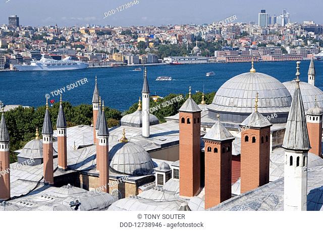 Turkey, Istanbul, Topkapi Palace, Palace's minarets, turrets and domes, with view across Bosphorus