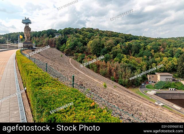 Gileppe dam in Belgium with pathway, watch-tower and monumental Lion