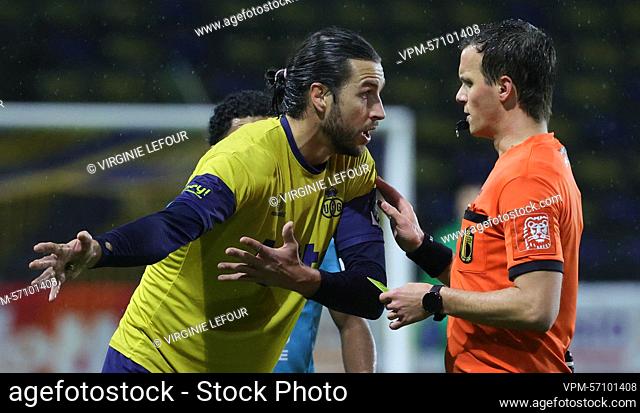 Union's Christian Burgess referee Kevin Van Damme pictured during a soccer game between Union Saint-Gilloise and KV Oostende