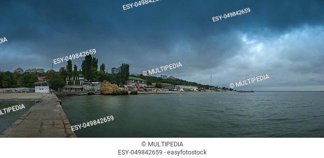 Odessa, Ukraine - 09.09.2018. Otrada beach in Odessa, Ukraine, in a gloomy summer morning. Dark clouds asperatus over the sea until dawn