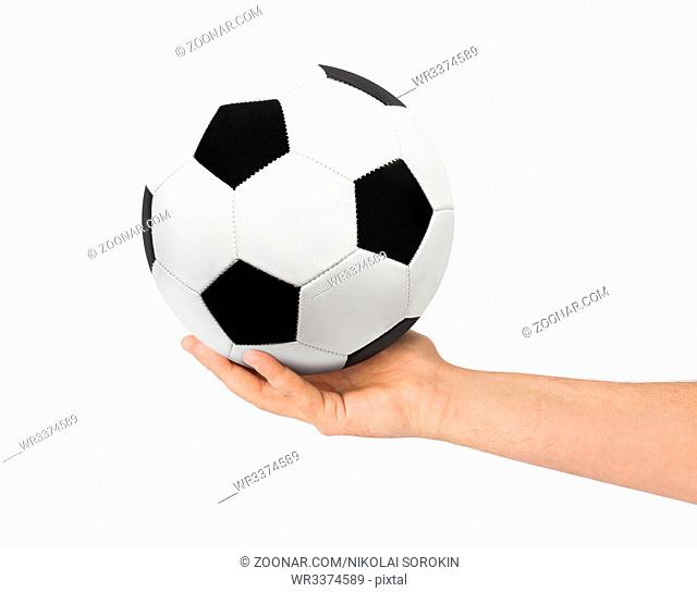 Hand and soccer ball isolated on white background